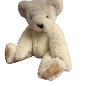 The Vermont Teddy Bear Company white poseable bear with tan paws and black nose